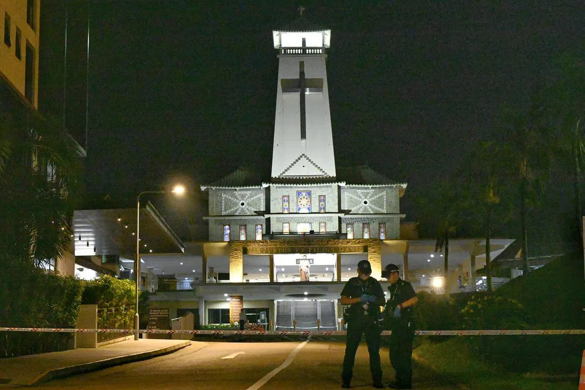 Police cordoning off the entrance of St Joseph’s Church in Bukit Timah after a stabbing incident on Nov 9.