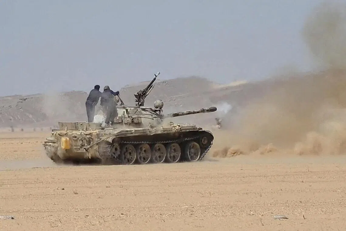 Yemen government forces hit Houthis in strategic Red Sea city