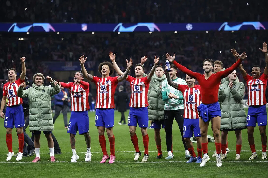 Soccer Football - Champions League - Round of 16 - Second Leg - Atletico Madrid v Inter Milan - Metropolitano, Madrid, Spain - March 13, 2024  Atletico Madrid players celebrate after the match REUTERS/Juan Medina