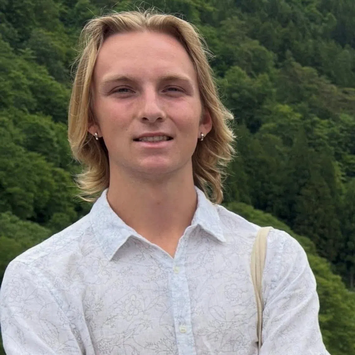 A photo of James Higginbotham, 20, who went missing on May 29. His mother, Nancy, seen here (right) with James' father Keith Higginbotham, said on Facebook on June 6 that his body had been found in a mountainous area outside Kyoto.