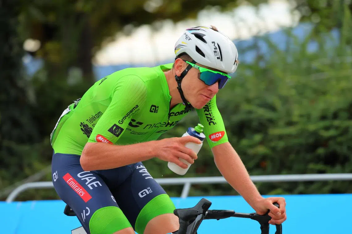FILE PHOTO: Cycling - UCI World Championships 2024 - Men's Elite Road Race - Zurich, Switzerland - September 29, 2024 Slovenia's Tadej Pogacar in action REUTERS/Denis Balibouse/File Photo
