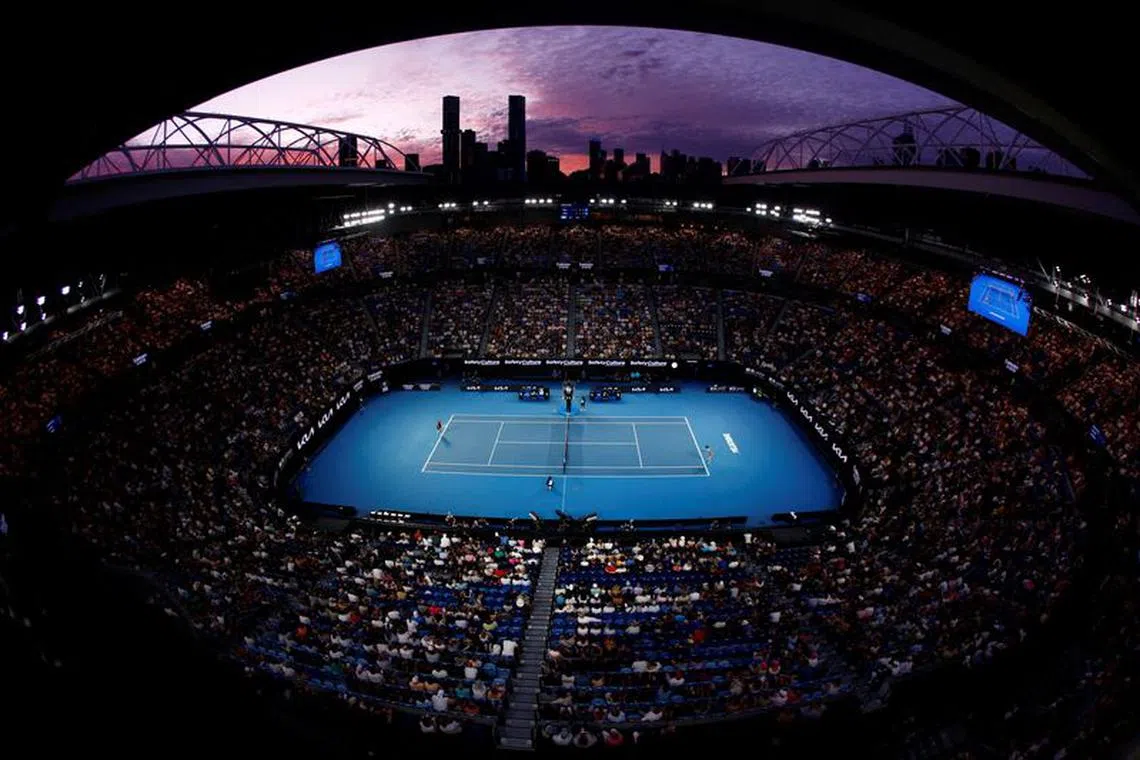 Tennis - Australian Open - Melbourne Park, Melbourne, Australia - January 20, 2024 General view of the Rod Laver arena during the third round match between Poland's Iga Swiatek and Czech Republic's Linda Noskova as the Melbourne skyline is seen in the background REUTERS/Issei Kato