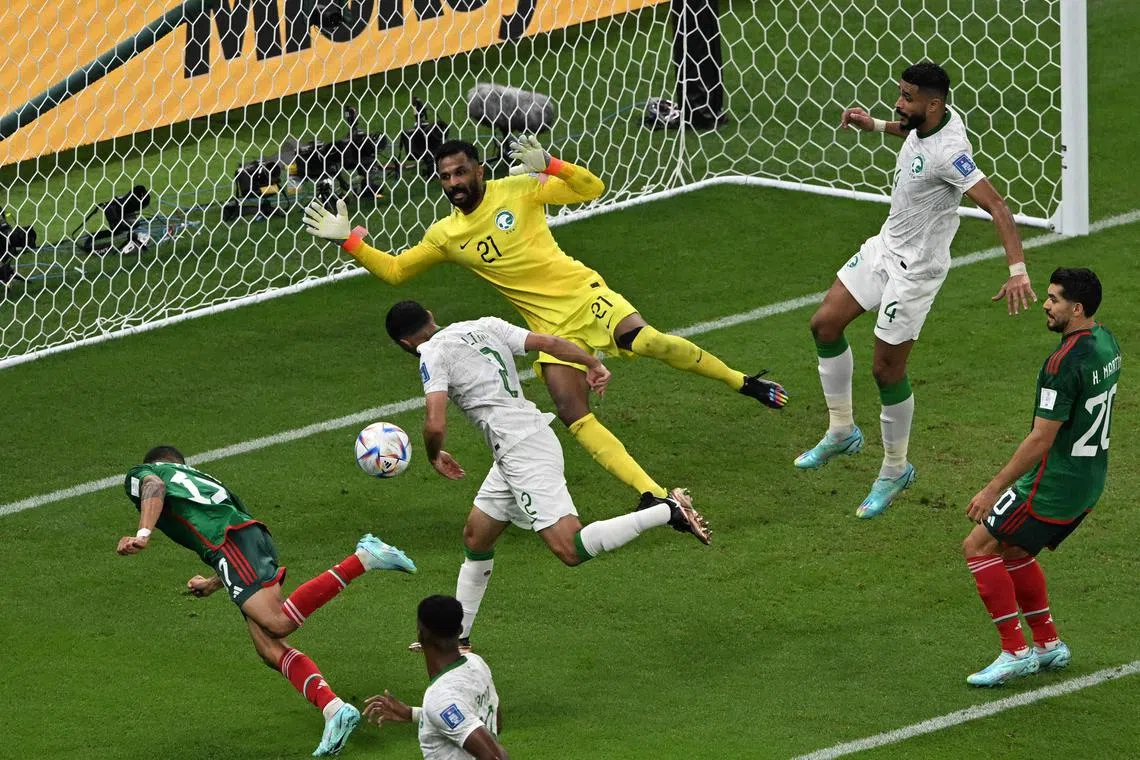 Mexico midfielder Orbelin Pineda fails to score past Saudi Arabia's goalkeeper Mohammed Al-Owais.
