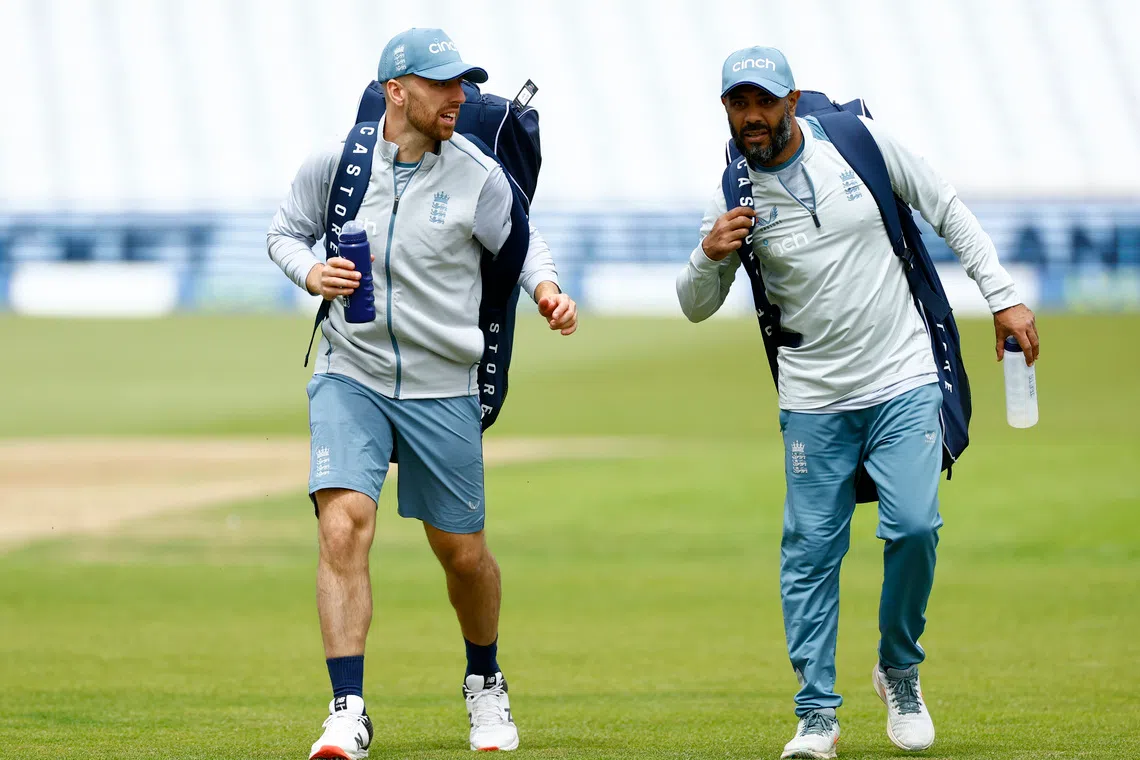 Cricket - England Practice Session - Trent Bridge, Nottingham, Britain - June 9, 2022 England's Jack Leach with spin coach Jeetan Patel during practice Action Images via Reuters/Andrew Boyers
