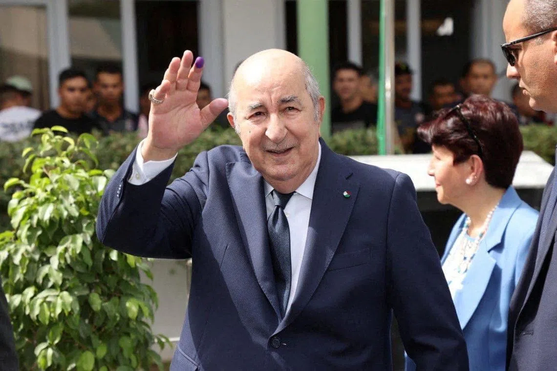 Algerian President and presidential candidate Abdelmadjid Tebboune gestures outside a polling station, during the presidential election in Algiers, Algeria September 7, 2024. Algerian Presidency/ Handout via REUTERS/File Photo