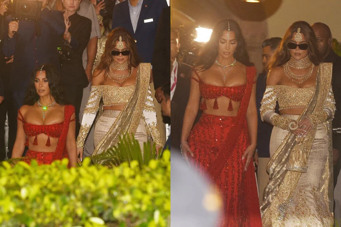 Kim and Khloe Kardashian reportedly leaving their hotel for the wedding ceremony on July 12.