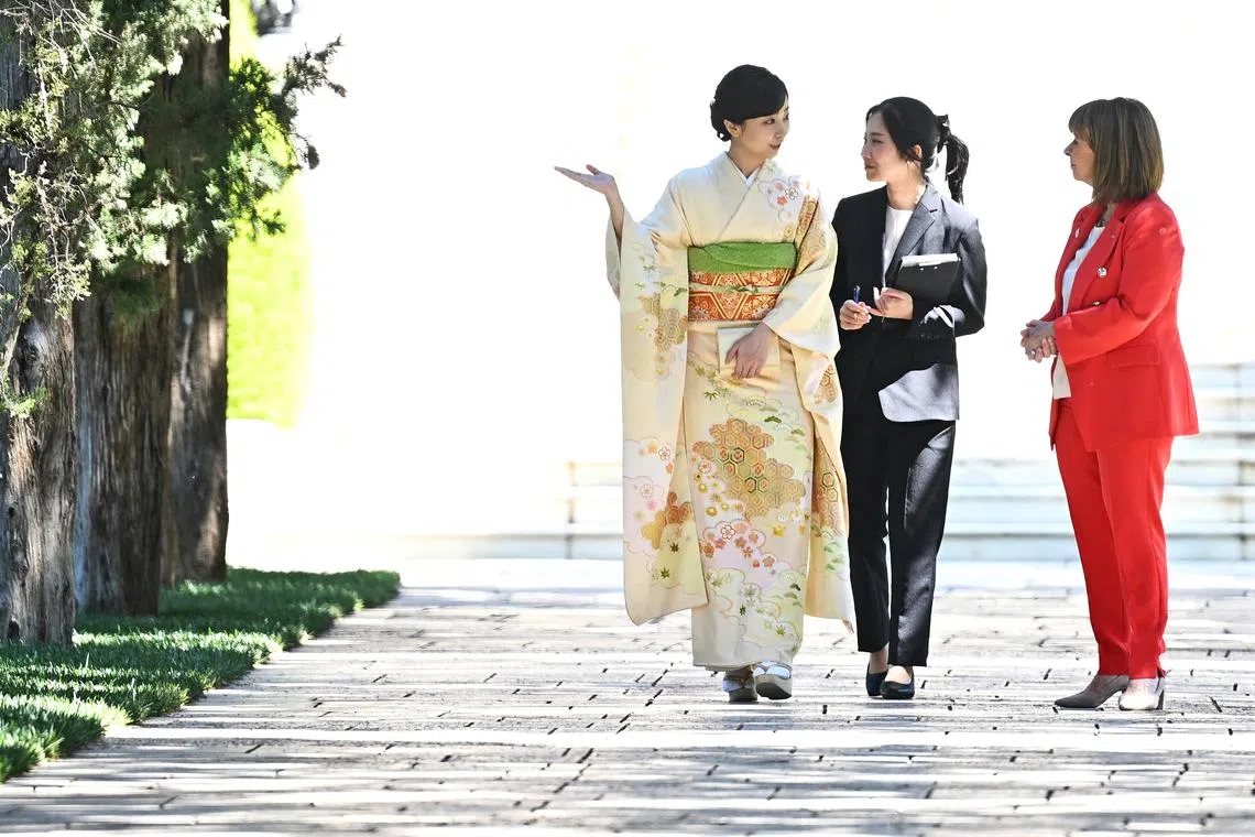 Japan's Princess Kako and Greek President Katerina Sakellaropoulou, accompanied by a translator, walk through the Presidential Palace in Athens, Greece, on May 28, 2024. 