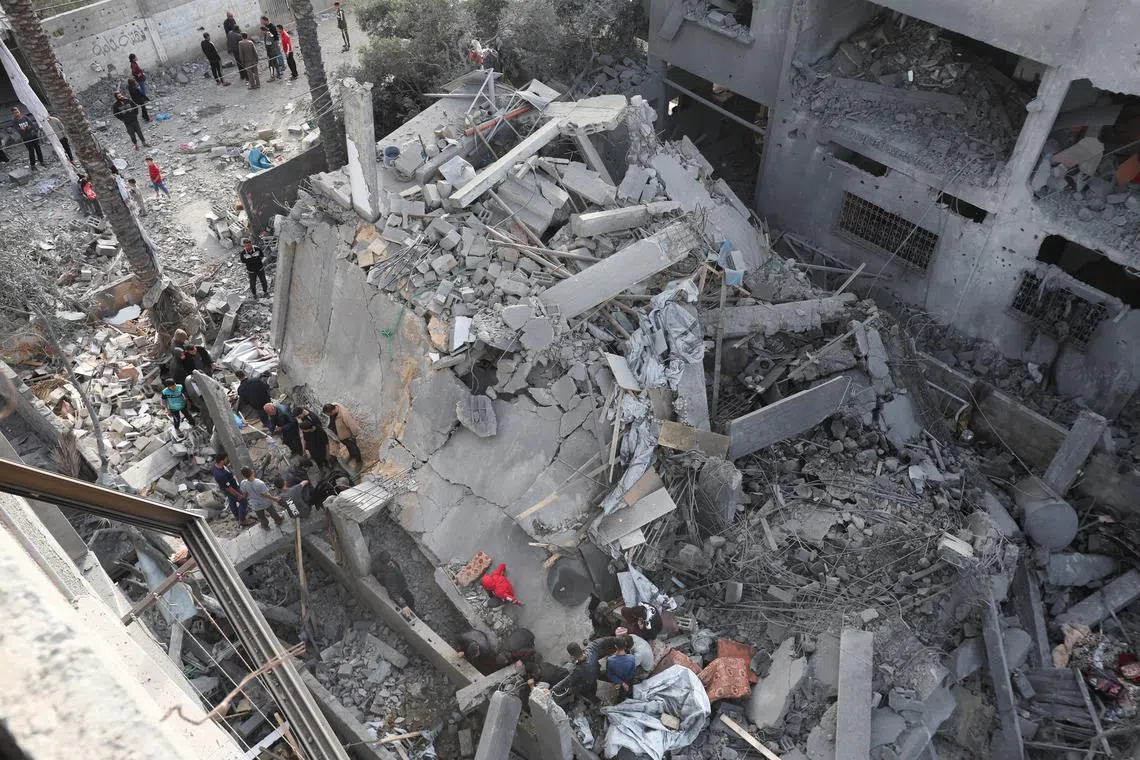 Israeli forces seen building positions in Gaza as they claim more ground
