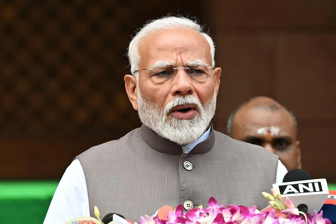 India's Prime Minister Narendra Modi addresses upon his arrival to attend the monsoon session of the parliament in New Delhi on July 22, 2024. (Photo by Sajjad HUSSAIN / AFP)