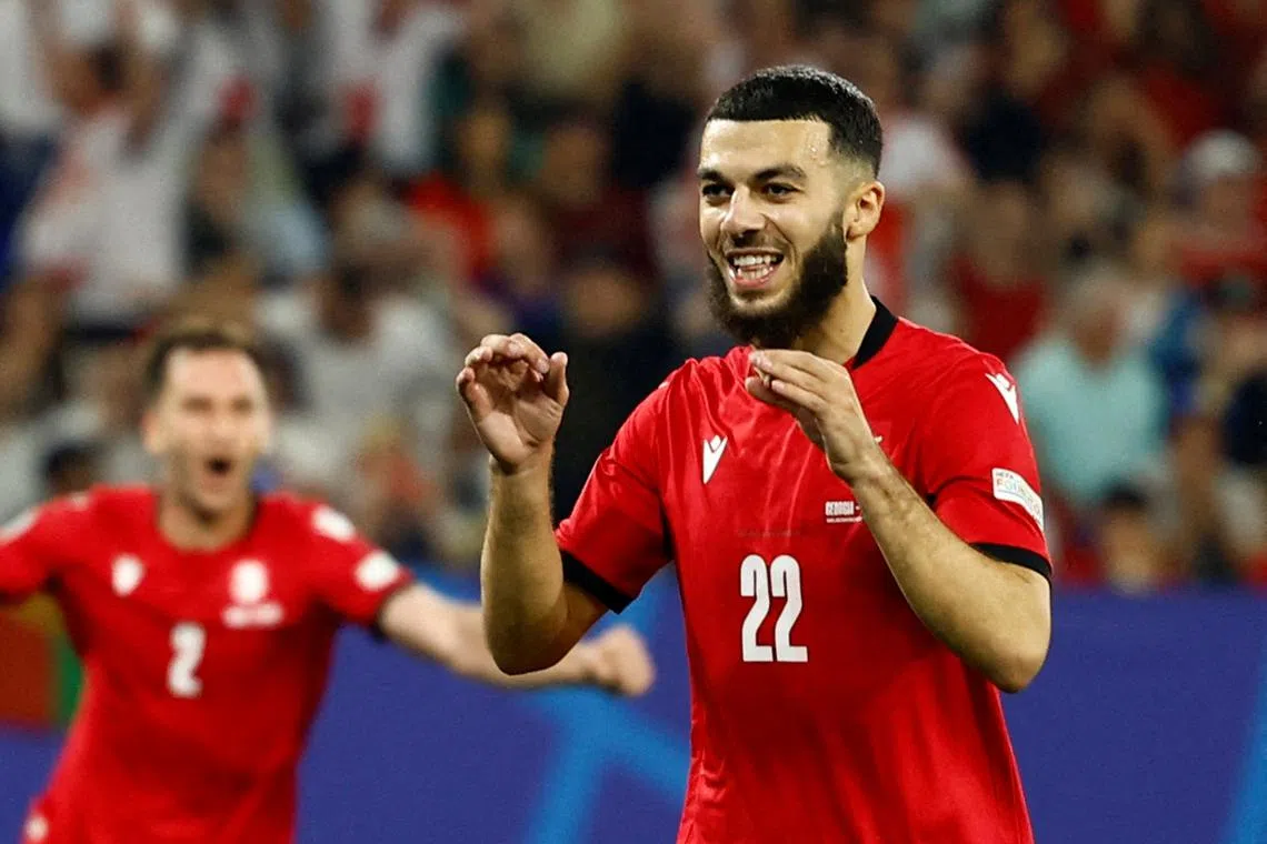 FILE PHOTO: Soccer Football - Euro 2024 - Group F - Georgia v Portugal - Arena AufSchalke, Gelsenkirchen, Germany - June 26, 2024  Georgia's Georges Mikautadze celebrates scoring their second goal REUTERS/Leon Kuegeler/File Photo