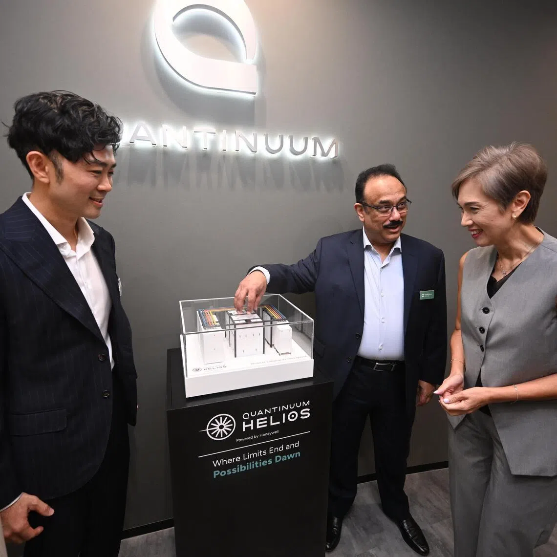 (From left) Dr Marvin Lee, Singapore country leader of Quantinuum, Dr Rajeeb Hazra, president and chief executive officer of Quantinuum, and Ms Josephine Teo, Minister for Digital Development and Information of Singapore, at the Quantinuum Singapore R&D and operations centre launch on March 11. 
