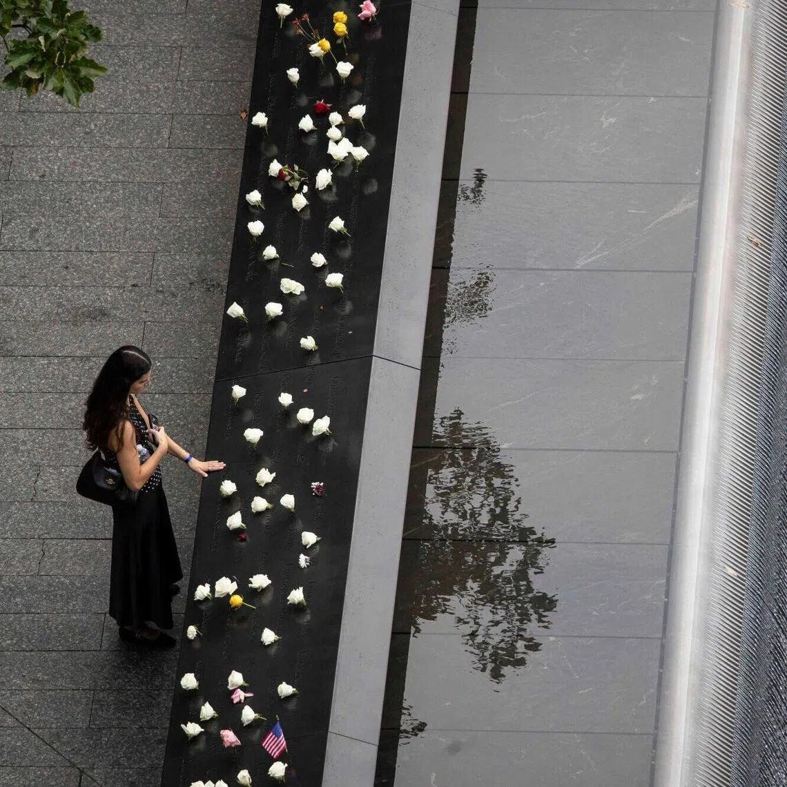 A woman visits the 9/11 Memorial and Museum in New York on Sept 11, ahead of the commemoration of the Sept 11, 2001, terror attacks.