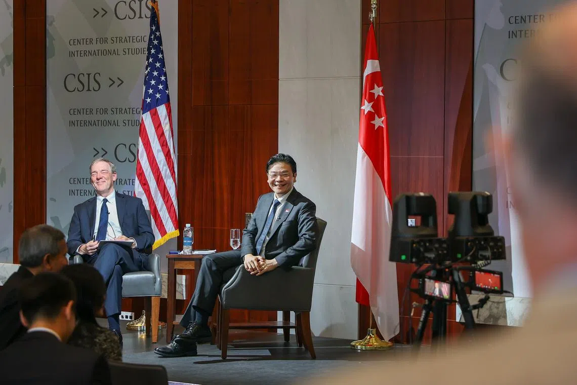 Deputy Prime Minister Lawrence Wong (right) at a dialogue at the Center for Strategic & International Studies on Oct 13.