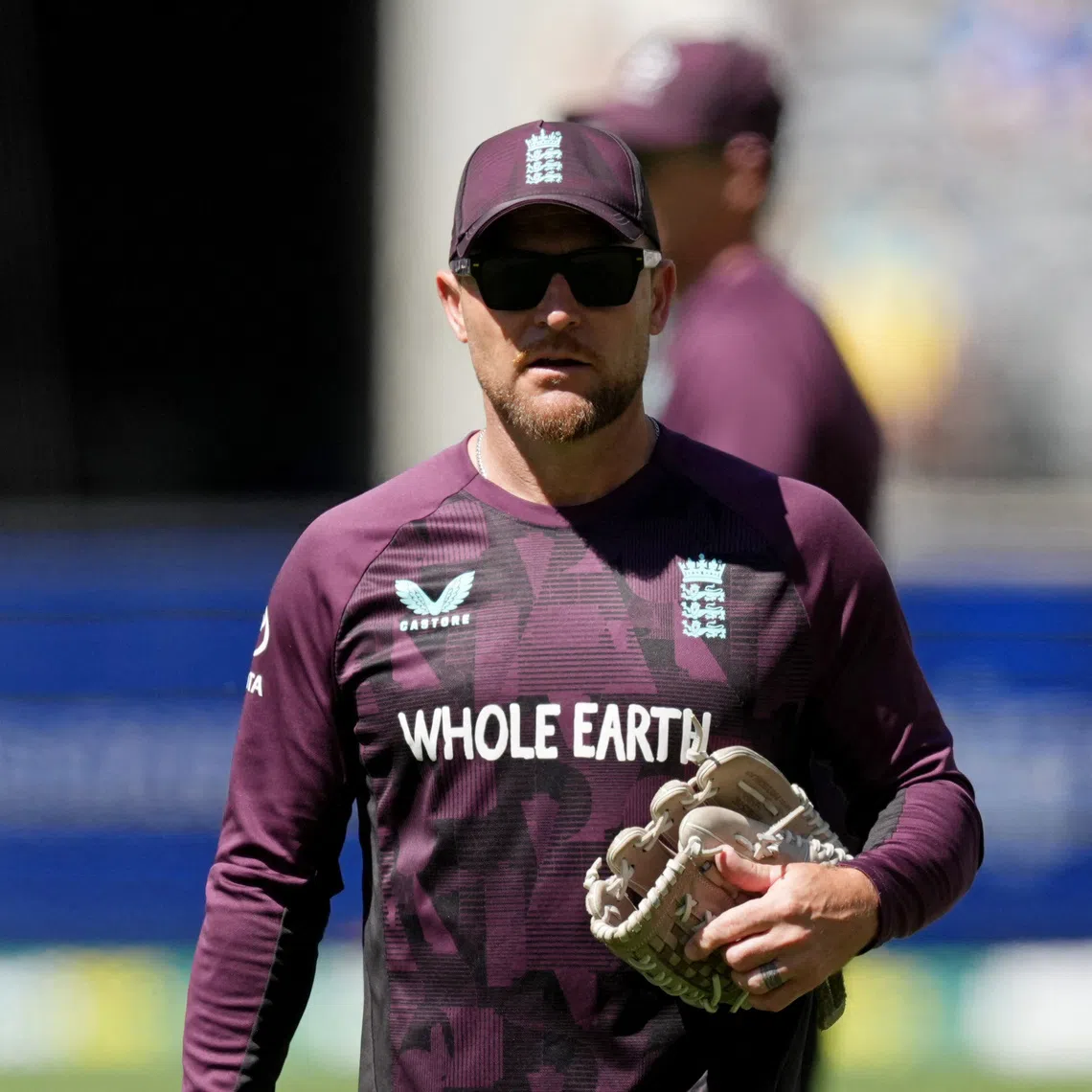 Cricket - The Ashes - Australia v England - First Test - Perth Stadium, Perth, Australia - November 21, 2025 England head coach Brendon McCullum during the warm up before the start of play on day one REUTERS/Asanka Brendon Ratnayake