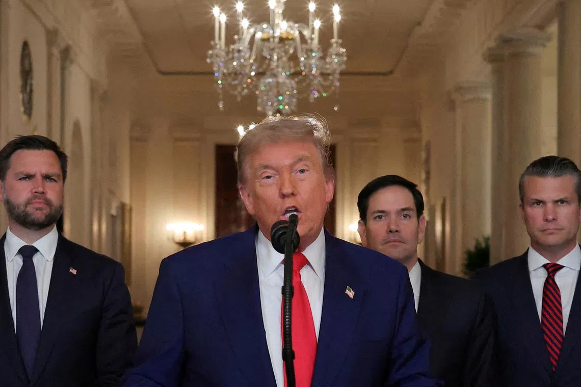 FILE PHOTO: U.S. President Donald Trump delivers an address to the nation accompanied by U.S. Vice President JD Vance, U.S. Secretary of State Marco Rubio and U.S. Defense Secretary Pete Hegseth, at the White House in Washington, D.C., U.S. June 21, 2025, following U.S. strikes on Iran's nuclear facilities. REUTERS/Carlos Barria/Pool/File Photo