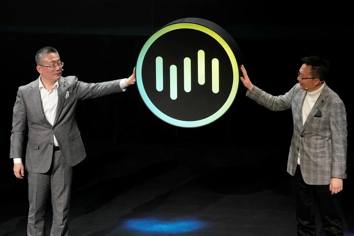 WM Motor's CEO Freeman Shen and Vice President of Strategic Planning Lobo Lu attend the WM Motor brand launch event in 2017.