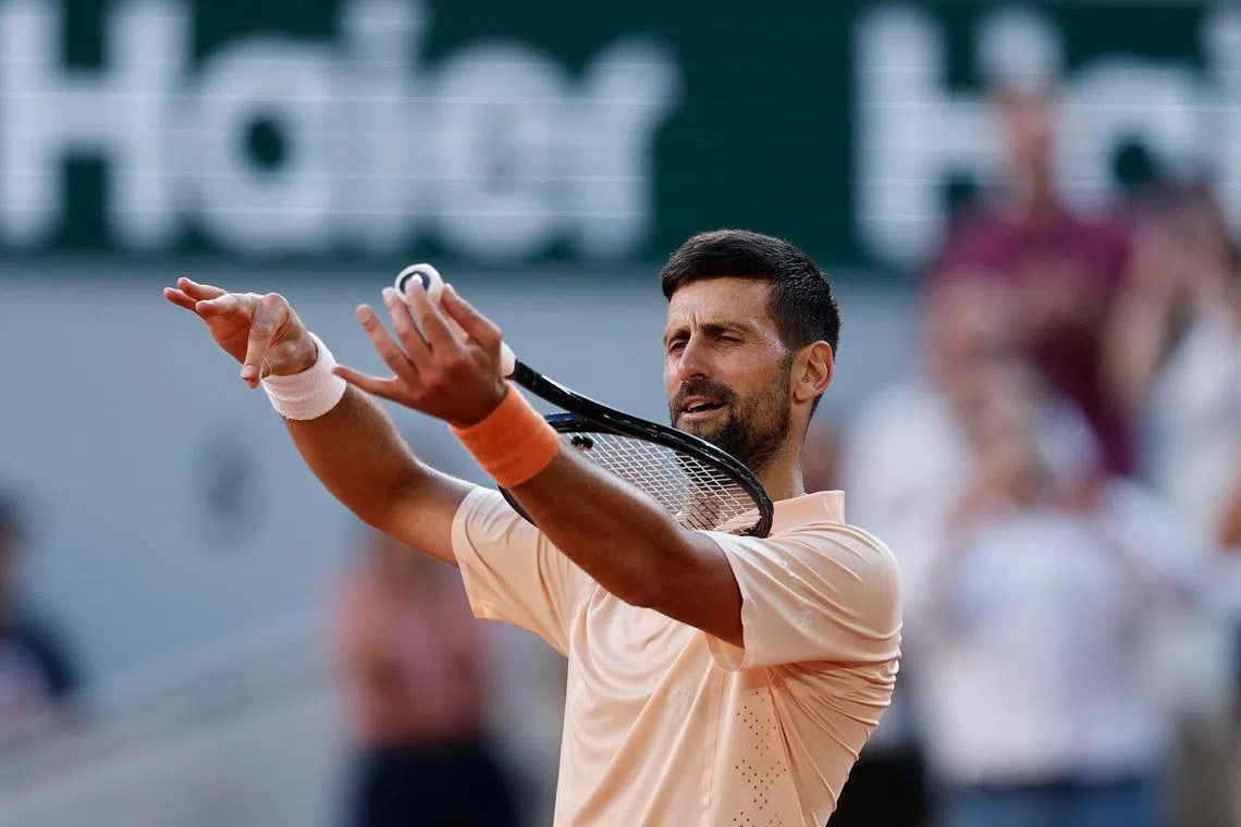 Tennis - French Open - Roland Garros, Paris, France - May 27, 2026 Serbia's Novak Djokovic celebrates winning his second round match against France's Valentin Royer REUTERS/Benoit Tessier