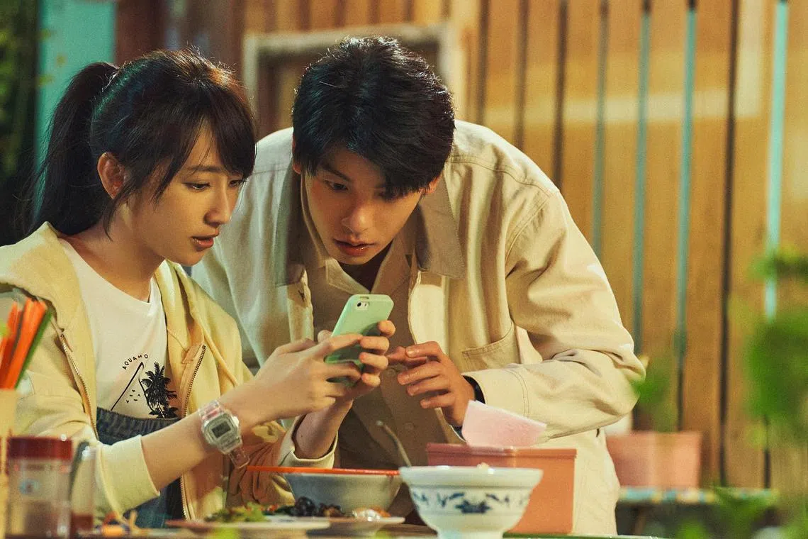 Alice Ko (left) and Greg Hsu play a couple in the time travel romance movie Someday Or One Day.
