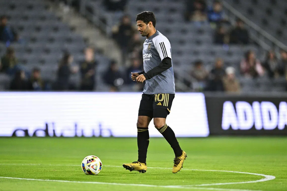 FILE PHOTO: Nov 8, 2024; Los Angeles, California, USA; LAFC forward Carlos Vela (10) warms up before a 2024 MLS Cup Playoffs Round One match against Vancouver Whitecaps FC at BMO Stadium. Mandatory Credit: Kelvin Kuo-Imagn Images/File Photo
