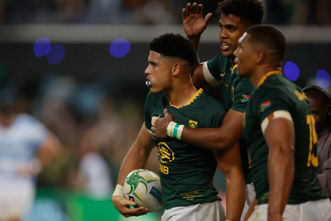 Rugby Union - Rugby Championship - South Africa v Argentina - Kings Park Stadium, Durban, South Africa - September 27, 2025 South Africa's Sacha Feinberg-Mngomezulu celebrates scoring their third try REUTERS/Rogan Ward