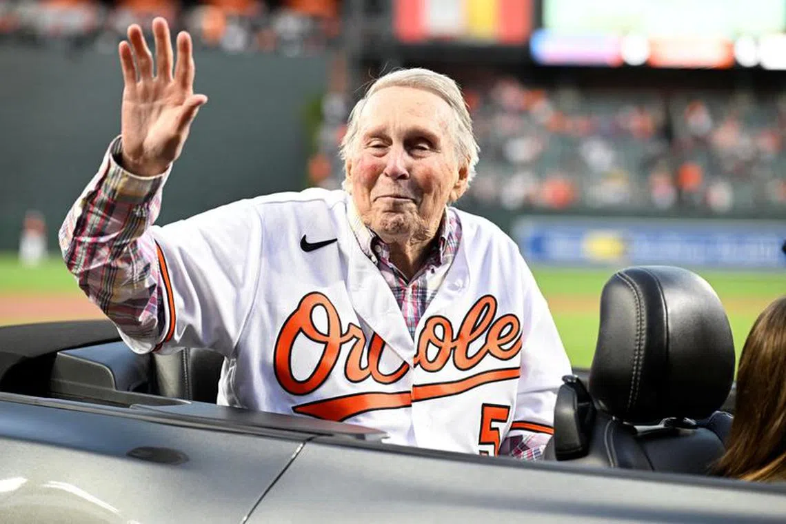 FILE PHOTO: Sep 24, 2022; Baltimore, Maryland, USA; Hall of Fame member and former Baltimore Orioles player Brooks Robinson waves to the crowd prior to a game between the Orioles and the Houston Astros at Oriole Park at Camden Yards. Mandatory Credit: James A. Pittman-USA TODAY Sports/File Photo