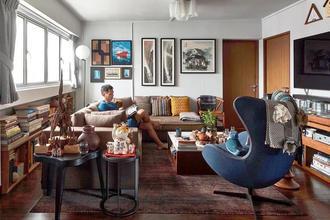 The tenth-storey Farrer Road flat is decorated with the owner's many treasured possessions.
