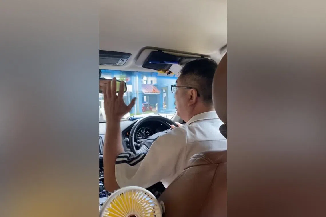 The passenger said the ride started uneventfully, but the driver suddenly got upset that part of the road was blocked due to construction.