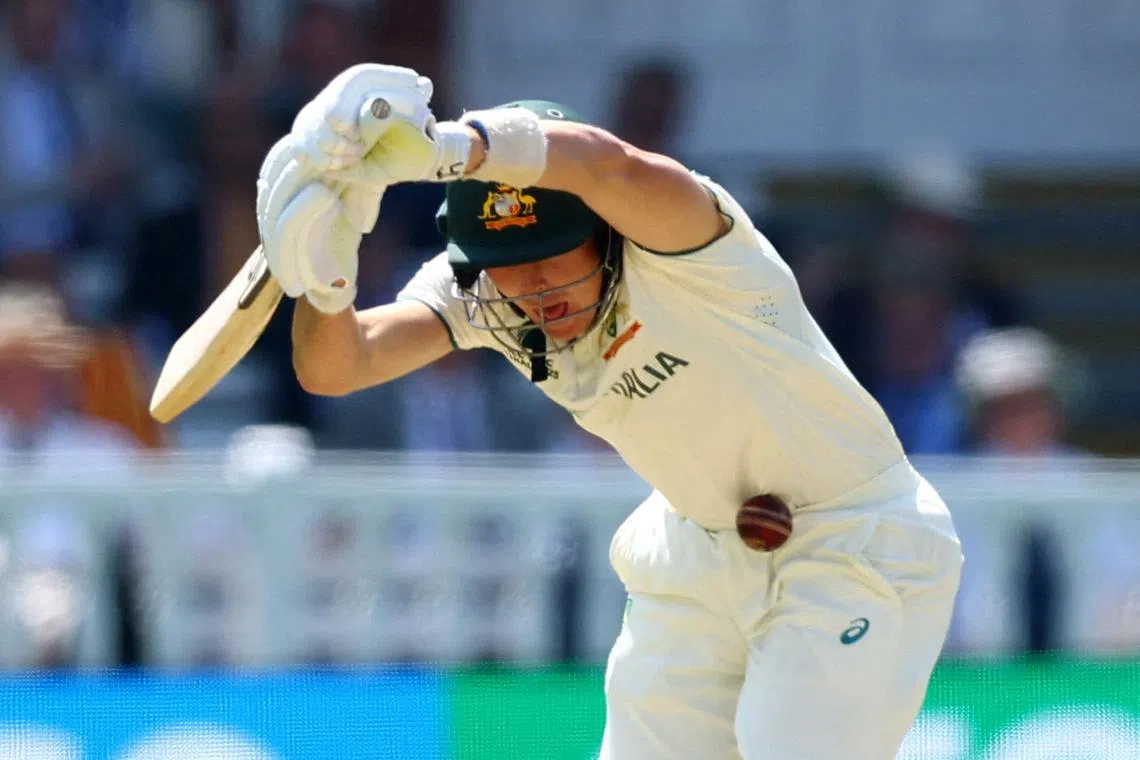 FILE PHOTO: Cricket - 2025 ICC World Test Championship Final - South Africa v Australia - Lord's Cricket Ground, London, Britain - June 12, 2025 Australia's Marnus Labuschagne reacts after getting hit by a bowl Action Images via Reuters/Andrew Boyers/File Photo
