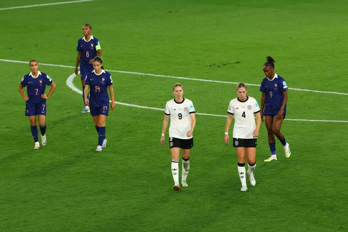 FILE PHOTO: Soccer Football - UEFA Women's Euro 2025 - Quarter Final - France v Germany - St. Jakob-Park, Basel, Switzerland - July 19, 2025  Germany's Sjoeke Nusken and Rebecca Knaak at the end of normal time REUTERS/Bernadett Szabo/File Photo