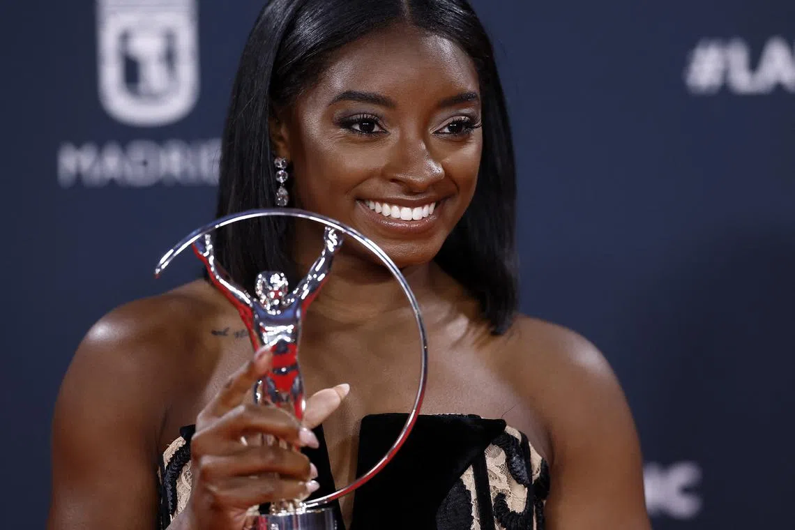 Laureus World Sports Awards - Palacio de Cibeles, Madrid, Spain  - April 21, 2025 United States gymnast Simone Biles poses with the sportswoman of the year award after the ceremony REUTERS/Juan Medina/ File Photo
