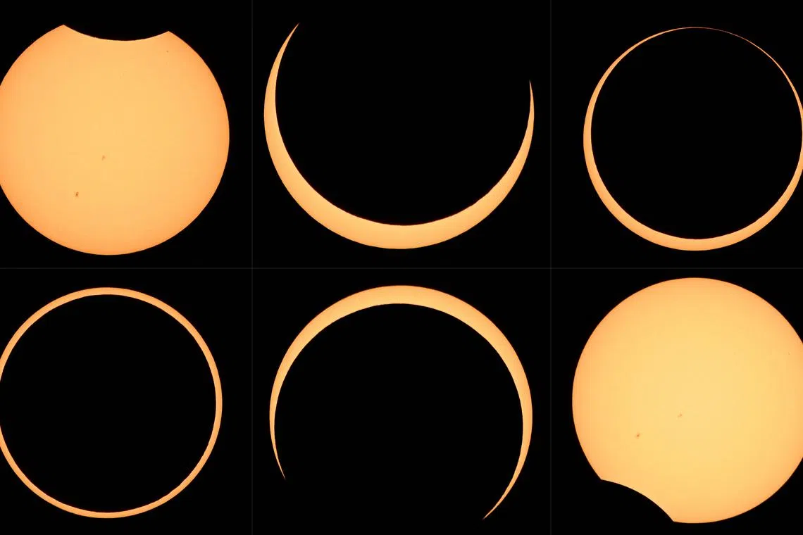 A combination of pictures made on Oct 14, 2023, showing the Moon crossing in front of the Sun over Albuquerque, New Mexico, during an annular eclipse.