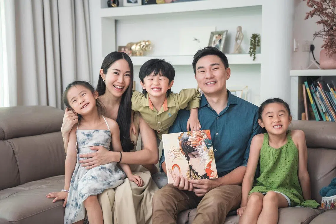 Mr Darren Cheng, chief executive of Direct Funeral Services, has authored a new book The Colours Of Missing You, which aims to help kids comprehend loss and grief. He is seen here with his wife Jenny Tay and their three kids.