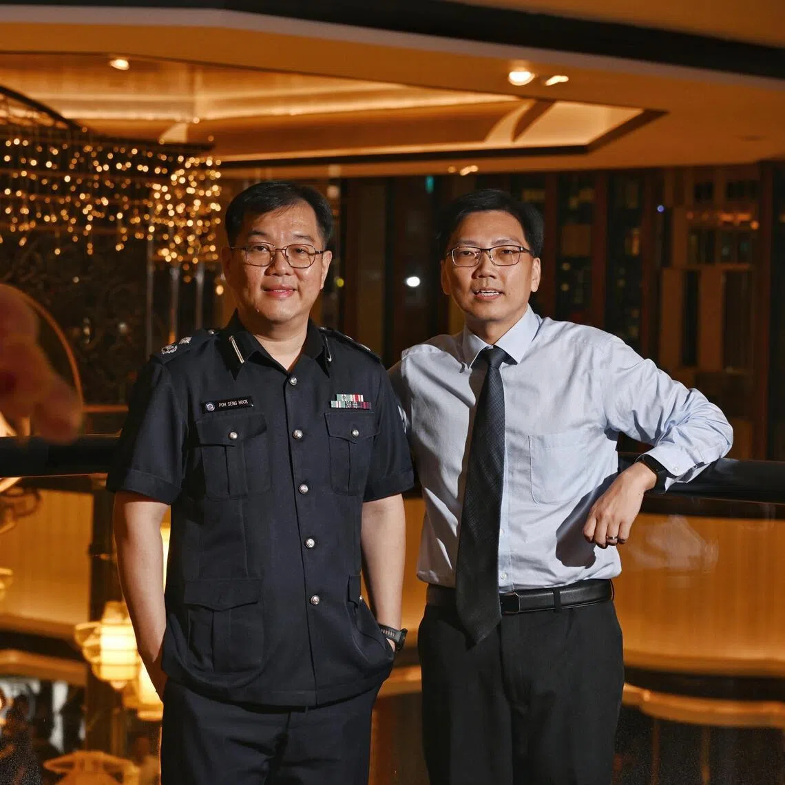 ICA Assistant Commissioner Poh Seng Hock (left) and Mr Ong Ka Hing, deputy director of the Robotics, Automation and Unmanned Systems Centre of Expertise at HTX, were among those who received their promotions at a Home Team Promotion Ceremony on April 13.