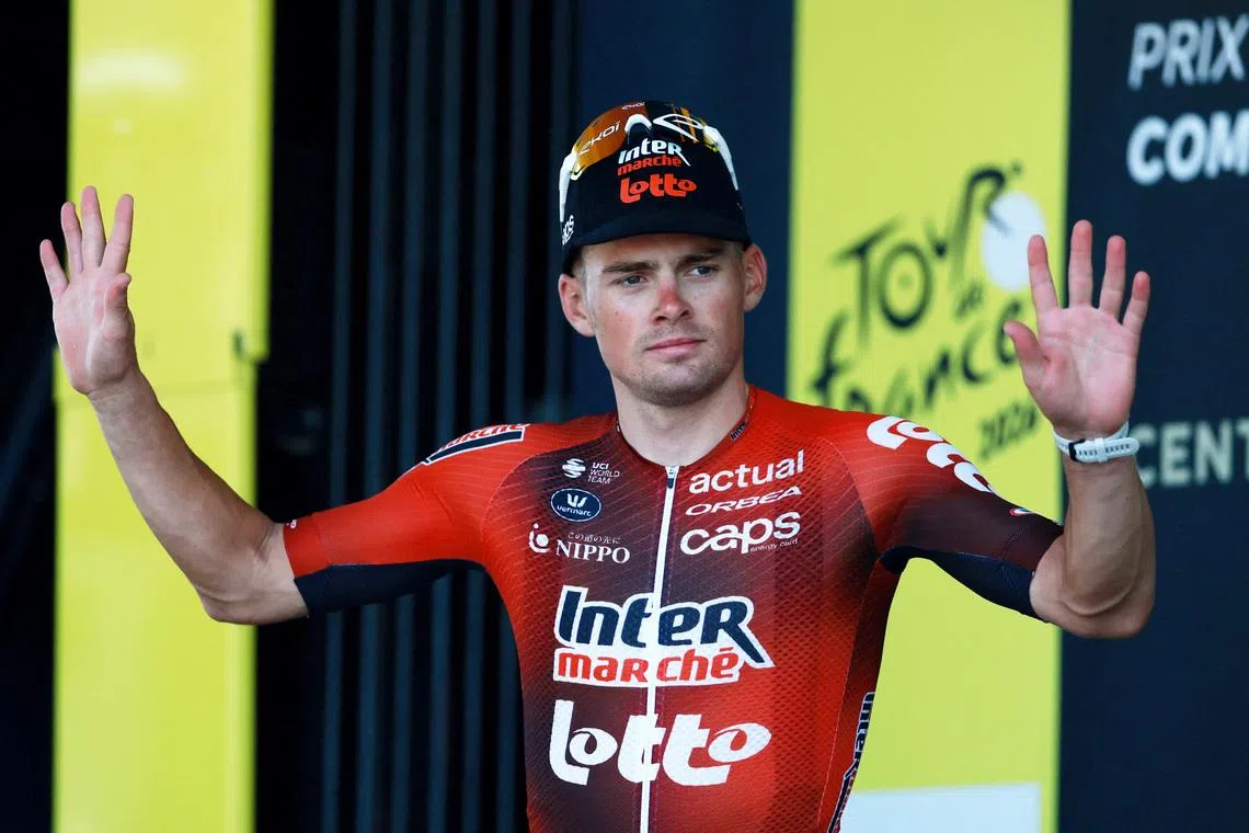 Cycling - Tour de France - Stage 7 - Hagetmau to Bordeaux - Hagetmau, France - July 10, 2026 Lotto Intermarche's Baptiste Veistroffer celebrates on the podium with the combative rider award after stage 7 REUTERS/Stephanie Lecocq