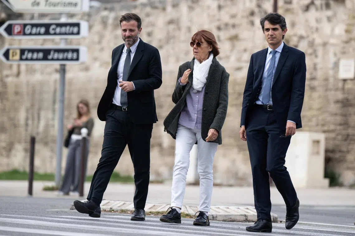 Rape victim Gisele Pelicot (centre), with her lawyers Stephane Babonneau (right) and Antoine Camus, arriving at the Avignon courthouse on Oct 2.