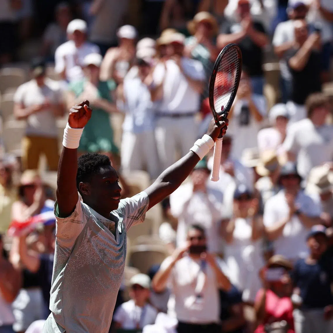France's Moise Kouame celebrates after winning his first round match on May 26 against Croatia's Marin Cilic at the French Open.