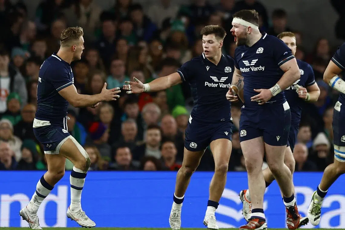 Rugby Union - Six Nations Championship - Ireland v Scotland - Aviva Stadium, Dublin, Ireland - March 16, 2024 Scotland's Huw Jones celebrates scoring their first try REUTERS/Clodagh Kilcoyne