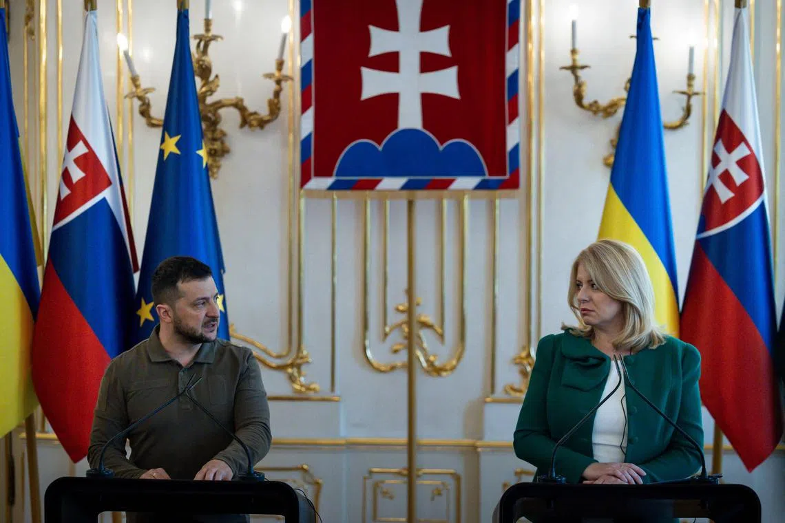 Ukrainian President Volodymyr Zelensky (left) gives a press briefing with Slovakian President Zuzana Caputova during a visit to Bratislava in July.