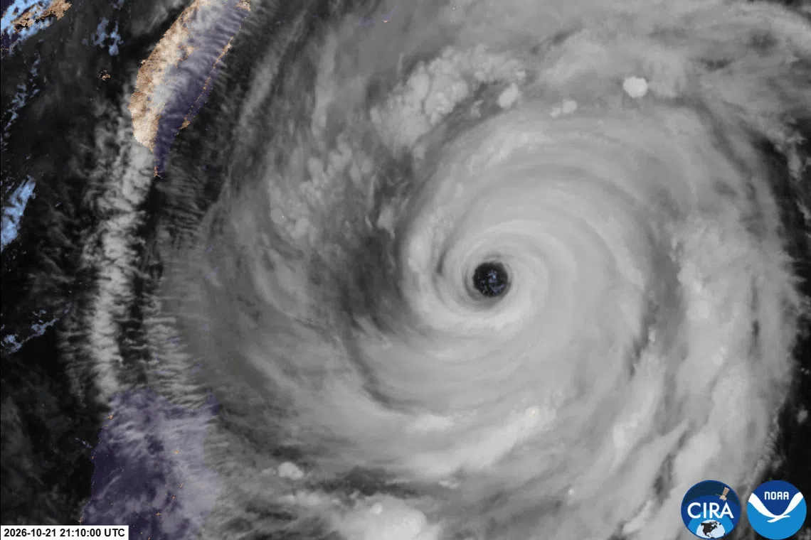 A close up of the eye of Typhoon Champi swirling over the Philippine Sea, as seen from space on Oct 21.