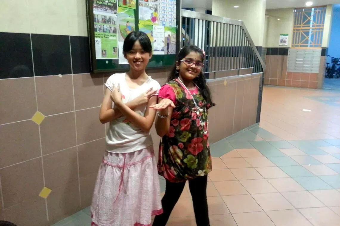 Jade with her primary school friend Snigdha Sri.