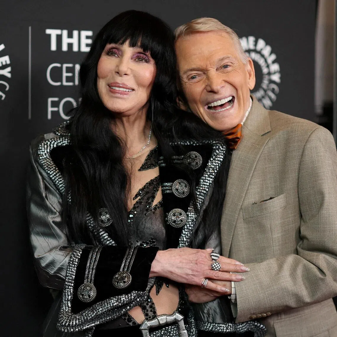 Fashion designer Bob Mackie and singer Cher attend a premiere for the documentary “Bob Mackie: Naked Illusion” in Los Angeles, California, on May 13, 2024.