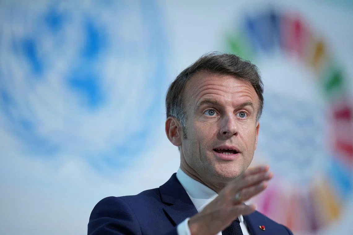 FILE PHOTO: France's President Emmanuel Macron gestures as he speaks during the presentation of the European Ocean Pact during the third United Nations Ocean Conference (UNOC3) in Nice, France, June 9, 2025. Laurent Cipriani/Pool via REUTERS/File Photo