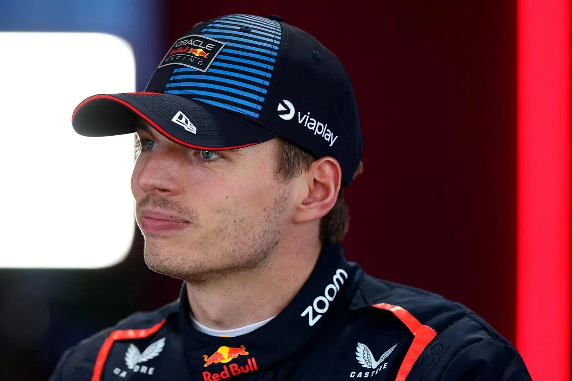 FILE PHOTO: Formula One F1 - Australian Grand Prix - Melbourne Grand Prix Circuit, Melbourne, Australia - March 23, 2024 Red Bull's Max Verstappen after pole position talks to the media REUTERS/Mark Peterson/File Photo