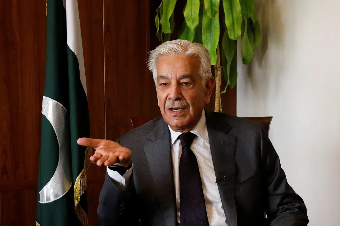 Pakistan's Defence Minister Khawaja Muhammad Asif speaks during an interview with Reuters in Islamabad, Pakistan, October 20, 2025. REUTERS/Salahuddin