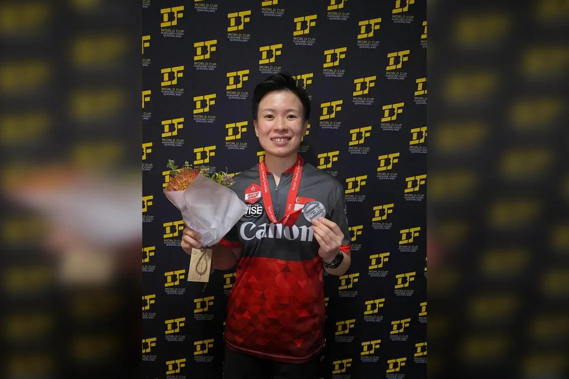 Singaporean bowler New Hui Fen posing with her medal after finishing second at the IBF World Cup in Queensland, Australia.