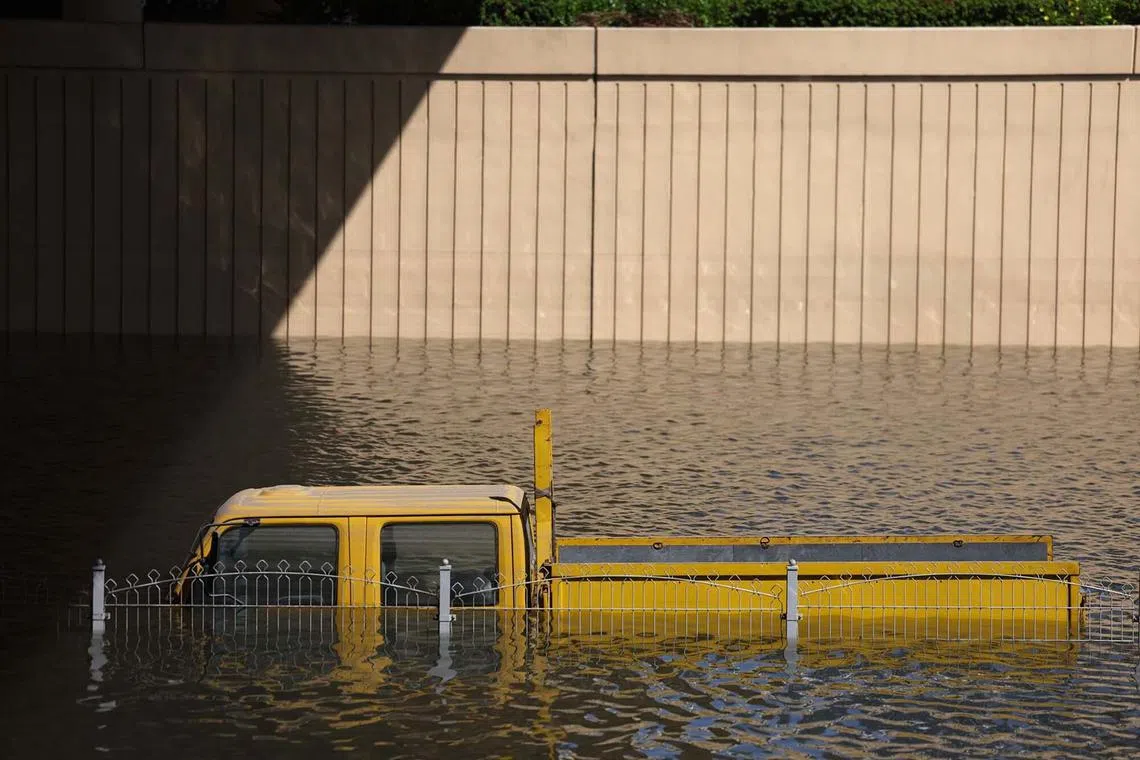 A vehicle abandoned in flood water after a rainstorm in Dubai, United Arab Emirates, on Wednesday, April 17, 2024. The United Arab Emirates experienced its heaviest downpour since records began in 1949, Dubai’s media office said in a statement. 