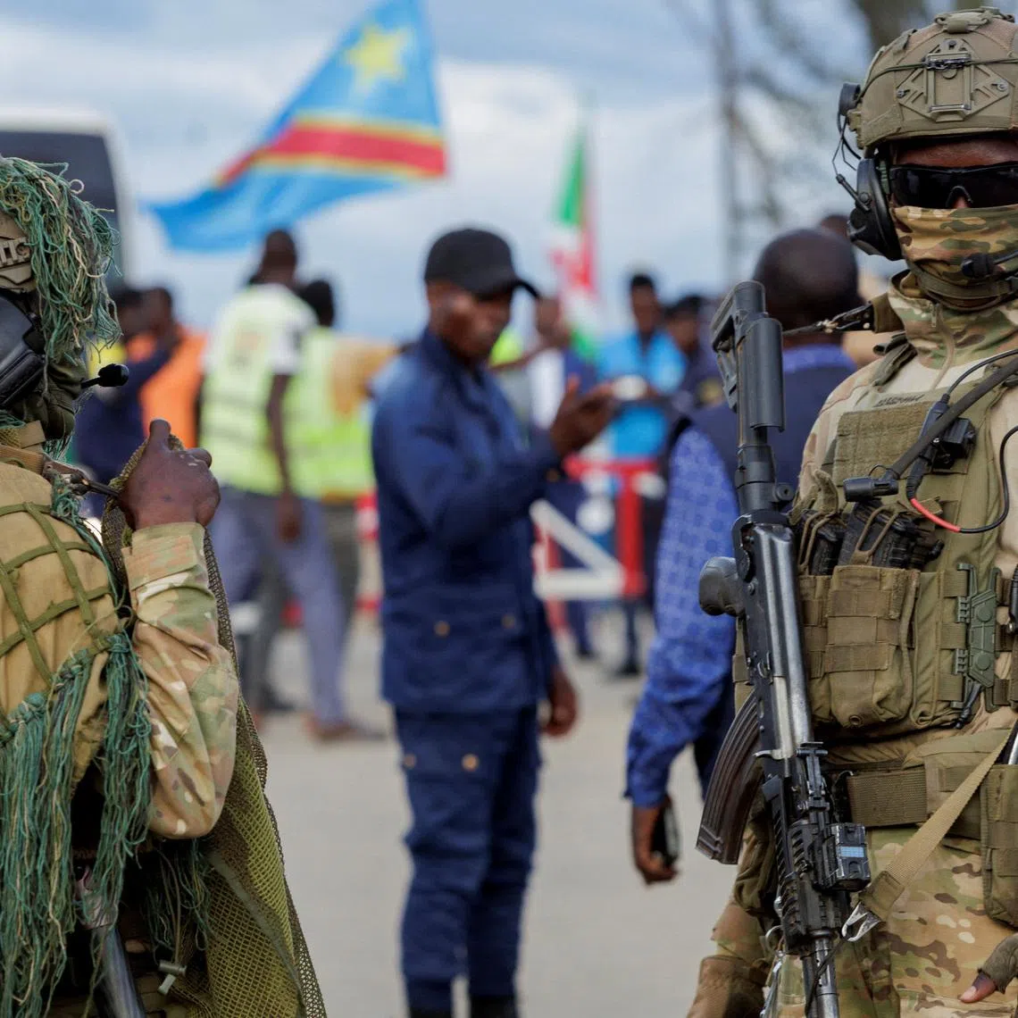 Congolese soldiers stand guard during the repatriation of Congolese refugees from Busuma camp in Democratic Republic of Congo, April 23, 2026. REUTERS/Evrard Ngendakumana