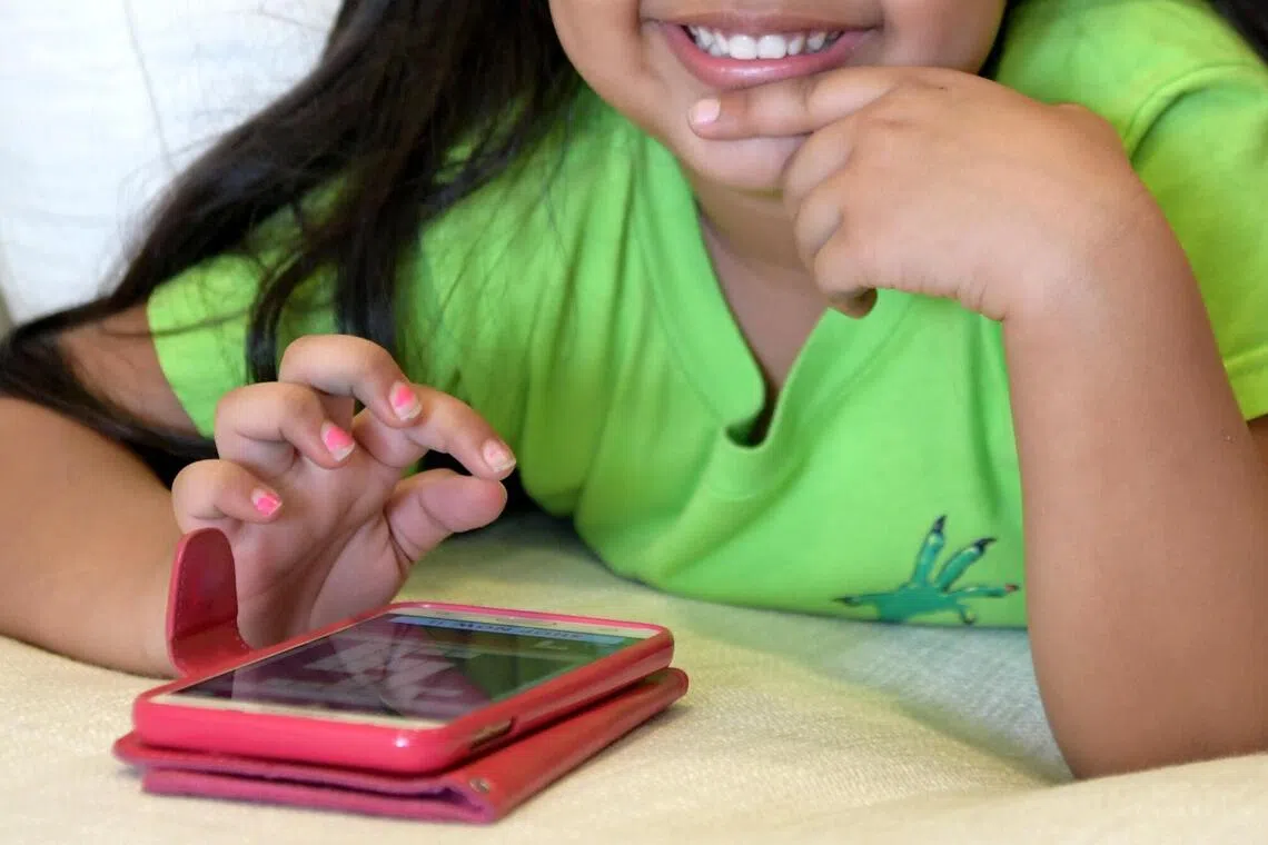 Having a smartphone before age 12 could pose health risks to children, study says