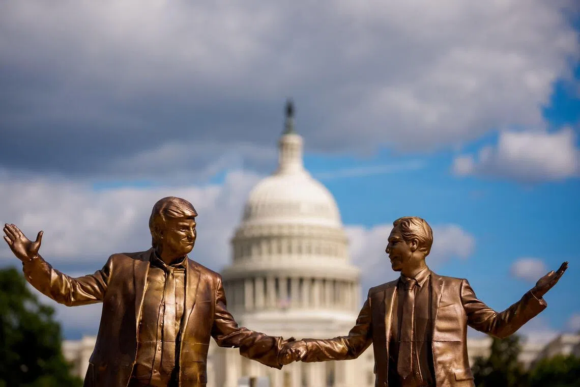 A statue depicting US President Donald Trump (left) and Jeffrey Epstein in Washington.