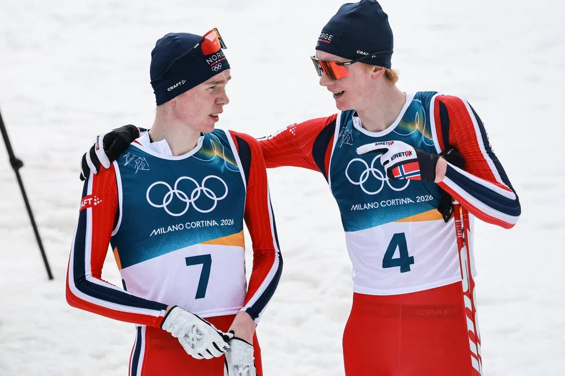 Milano Cortina 2026 Olympics - Nordic Combined - Individual Gundersen Normal Hill/10km, Cross-Country - Tesero Cross-Country Skiing Stadium, Lago, Italy - February 11, 2026. Gold medallist Jens Luraas Oftebro of Norway reacts with Einar Luraas Oftebro of Norway after crossing the finish line. REUTERS/Stephanie Lecocq/File Photo